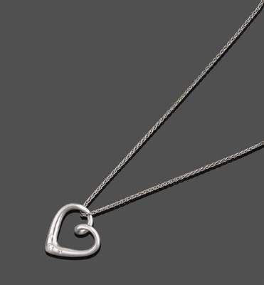 Lot 2153 - A Platinum Diamond Set Heart Pendant on A Platinum Chain, the heart motif border with three...