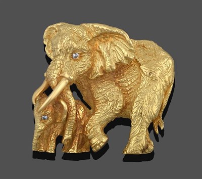 Lot 2167 - An Elephant and Calf Brooch, realistically modelled in a walking pose, with diamond set eyes in...