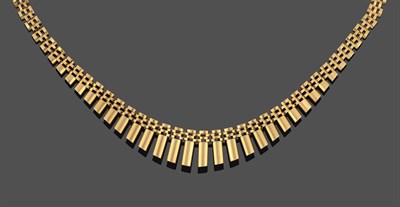 Lot 2169 - An 18 Carat Gold Fancy Link Necklace, the yellow brick link chain with graduated fringe detail...