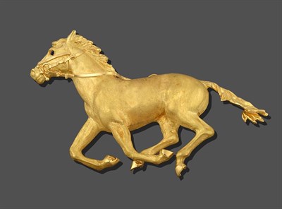 Lot 2170 - A Galloping Horse Brooch, the textured yellow horse realistically modelled in a galloping pose,...