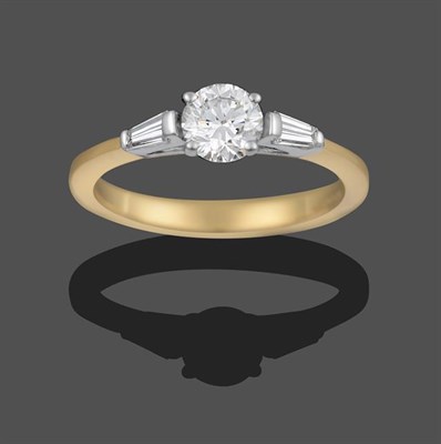 Lot 2183 - An 18 Carat Gold Diamond Solitaire Ring, the round brilliant cut diamond in a white claw...