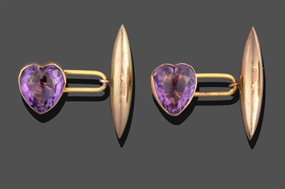 Lot 2184 - A Pair of 9 Carat Gold Amethyst Cufflinks, the heart shaped amethyst in a yellow rubbed over...