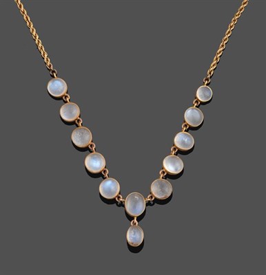 Lot 2186 - A Moonstone Necklace, the graduated cabochon moonstones with a central pendant drop in yellow...