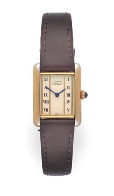 Lot 2268 - A Silver and Plated Rectangular Wristwatch, signed Cartier, model: Must de Cartier, circa 1990,...