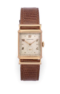 Lot 2311 - A 14 Carat Gold Rectangular Shaped Wristwatch, signed Longines, circa 1950, (calibre 9L) lever...