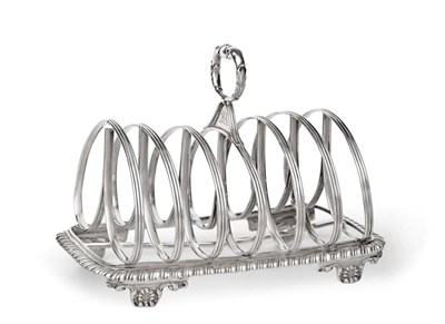 Lot 2340 - A George IV Silver Toast-Rack, by Richard Pearce and George Burrows, London, 1828, oblong and...