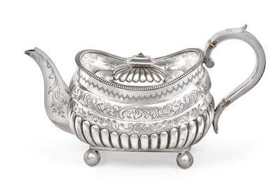 Lot 2344 - A Victorian Silver Teapot, by Richard Martin and Ebenezer Hall, London, 1879, oblong and on...