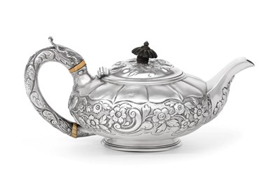 Lot 2346 - A George IV Silver Teapot, Maker's Mark IB, London, 1824, compressed circular and on collet...