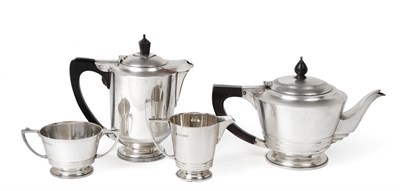 Lot 2440 - A Three-Piece George V Silver Tea-Service with a Similar Edward VIII Hot-Water Jug, by Edward...