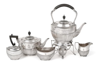 Lot 2442 - A Four-Piece Edward VII Silver Tea-Service with a Victorian Silver Tea-Caddy En-Suite, by...