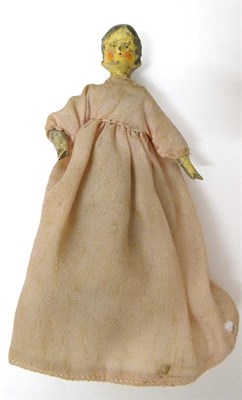 Lot 2005 - Late 18th Century Carved and Painted Wooden Doll, with painted locks to her forehead, blushed...