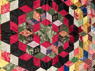 Lot 2007 - Victorian Crazy Patchwork Bed Cover, in the tumbling block pattern around a central star,...