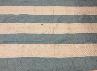 Lot 2013 - Late 19th Century Blue and White Strippy Quilt, decoratively quilted overall with palm leaves...