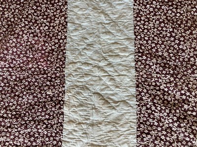 Lot 2014 - Early 20th Century North Country Strippy Quilt, in grey and mauve sprigged floral printed...