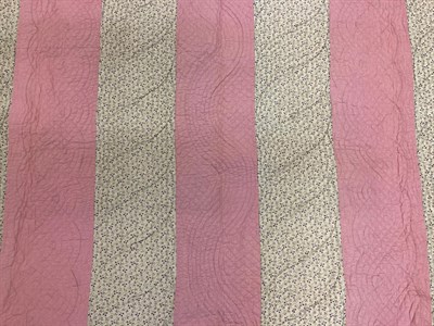 Lot 2015 - Late 19th Century Strippy Quilt, comprising pink and violet coloured floral sprigged stripes,...