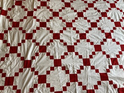 Lot 2017 - Late 19th Century Irish Chain Pattern Patchwork Bed Cover, in turkey red and white, within a...