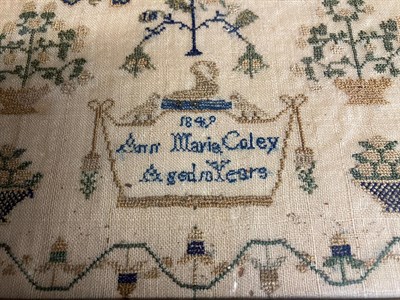 Lot 2026 - A Decorative Sampler Worked by Ann Maria Coley, Dated 1849 Aged 10 Years, worked in cross...
