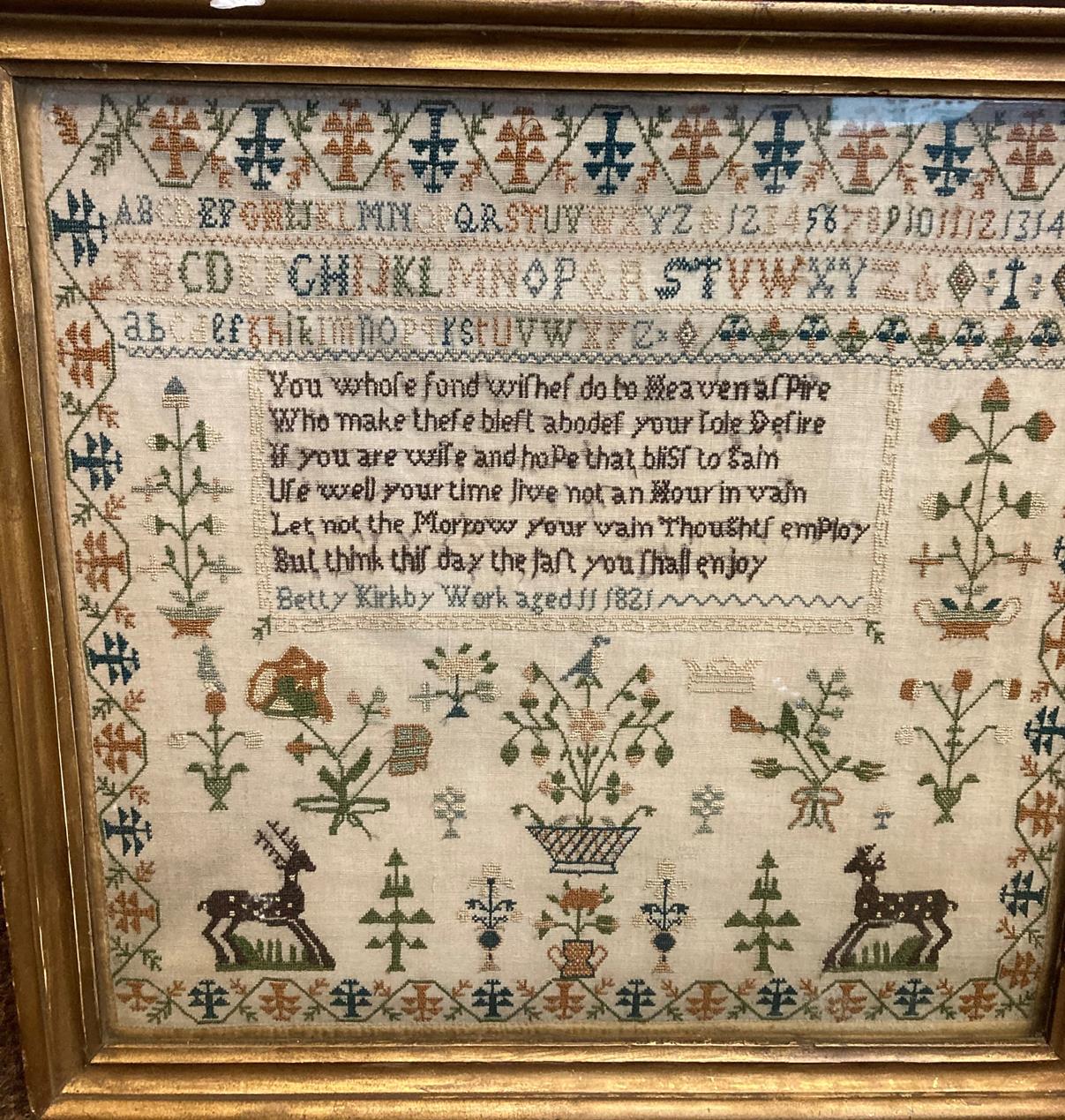 Lot 2027 - Alphabet Sampler Worked by Betty Kirkby Aged 11 Dated 1821, worked in cross stitch with central...