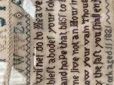 Lot 2027 - Alphabet Sampler Worked by Betty Kirkby Aged 11 Dated 1821, worked in cross stitch with central...