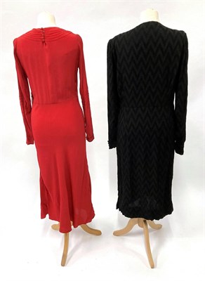 Lot 2036 - A Circa 1920s Wisco Model Black Wool Dress, woven with chevrons/zig zags overall, long sleeves with