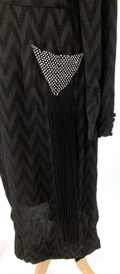Lot 2036 - A Circa 1920s Wisco Model Black Wool Dress, woven with chevrons/zig zags overall, long sleeves with