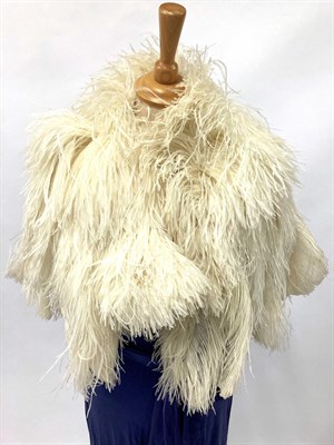 Lot 2040 - Circa 1920s White Ostrich Feather Shoulder Capelet, two feather head pieces in pink and black,...