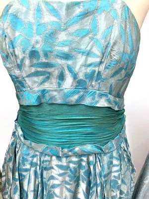 Lot 2054 - Circa 1950s Ladies' Evening Dresses, comprising Sambo Fashions pale blue brocade dress with...