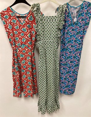 Lot 2056 - Assorted Circa 1950s/1960s Aprons and House Coats, in decorative printed cottons on tabards,...
