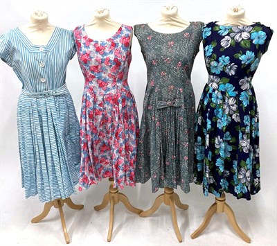 Lot 2057 - Assorted Circa 1950s Ladies' Printed Cotton Day Dresses, comprising a pink and floral striped...