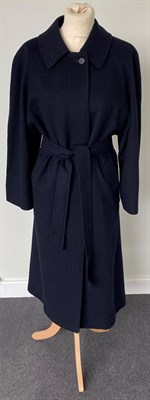 Lot 2067 - A Burberrys Lady's Dark Blue Wool 3/4-Length Belted Coat, 1980s/1990s, with concealed button...