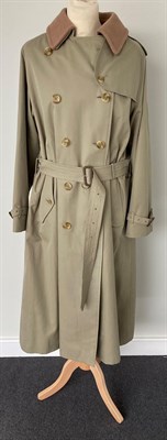 Lot 2074 - A Burberrys Lady's Light Khaki Double Breasted Belted Trench Coat, 1980s/1990s, with signature...