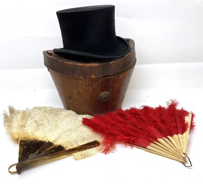 Lot 2097 - A Lock & Co Black Silk Top Hat, in brown leather mounted hat box; and Two Fans comprising a...