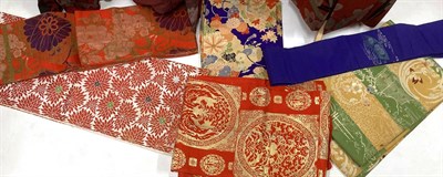 Lot 2118 - Six Decorative 20th Century Japanese Kimonos, of printed and woven designs including floral and...