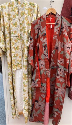 Lot 2118 - Six Decorative 20th Century Japanese Kimonos, of printed and woven designs including floral and...