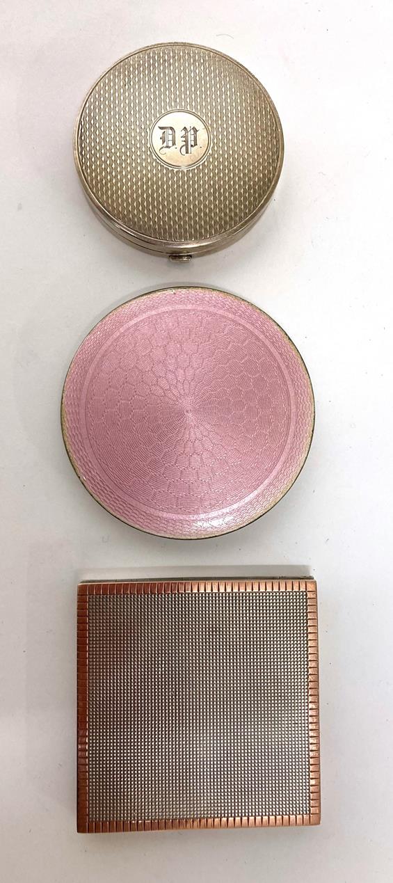 Lot 2121 - Three Silver and Enamel Hinged Compacts, including a silver square compact with gold edge by Deakin