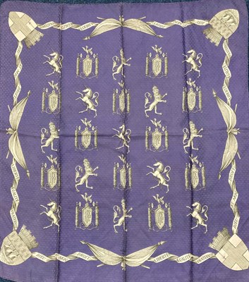 Lot 2132 - A Hermes Silk Scarf 'Liberté, Ègalité and Fraternite', on a lavender ground woven with a...