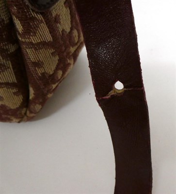 Lot 2159 - A Christian Dior Oblique Pattern Burgundy and Cream Shoulder Bag, with leather long adjustable...