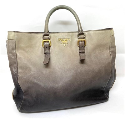 Lot 2160 - A Prada Grey Ombré Leather Shoulder Bag, with gilt metal Prada logo to front, twin carry...