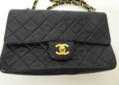 Lot 2169 - A Circa 1989-1991 Chanel Midnight Blue Quilted Lambskin Leather Handbag, the classic flap bag...