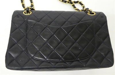 Lot 2169 - A Circa 1989-1991 Chanel Midnight Blue Quilted Lambskin Leather Handbag, the classic flap bag...