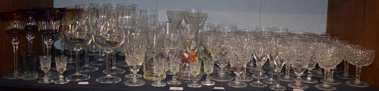 Lot 19 - A shelf of various drinking glasses including Stuart; coloured hock glasses; cut glass wines etc