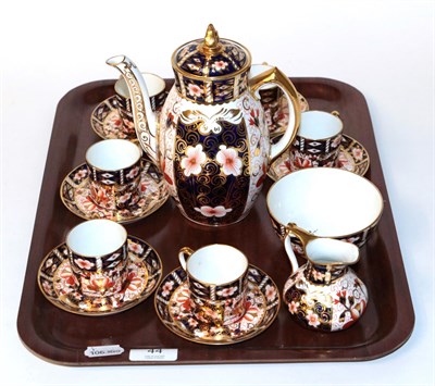 Lot 44 - Royal Crown Derby pattern 2451, to include: six coffee cans and saucers; coffee pot; cream jug; and