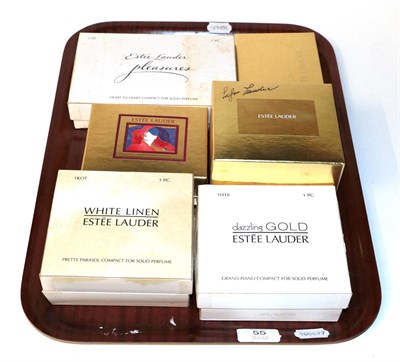 Lot 55 - Five assorted Estée Lauder solid perfume compacts, comprising 'Gold Grand Piano'; 'White Linen...
