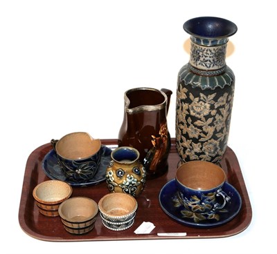 Lot 62 - A group of Doulton Lambeth stoneware including: cups and saucers; vases; salts; and a Royal Doulton