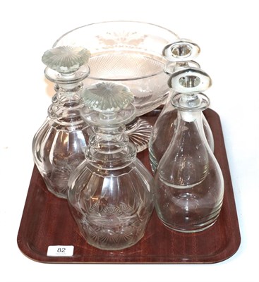Lot 82 - A pair of triple ring neck decanters; two similar decanters; and an etched glass pedestal bowl