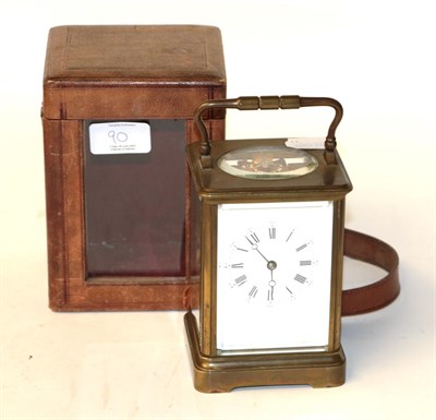 Lot 90 - A brass striking carriage clock, early 20th century, twin barrel movement with a later platform...
