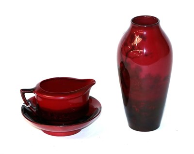 Lot 95 - A Royal Doulton Flambe vase, together with a further flambe jug and bowl (3)