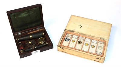 Lot 103 - A 19th century brass microscope in fitted wooden case, together with another case of...