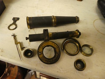 Lot 103 - A 19th century brass microscope in fitted wooden case, together with another case of...