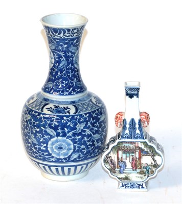 Lot 118 - A Chinese blue and white bottle vase, floral design; together with a Chinese famille verte...